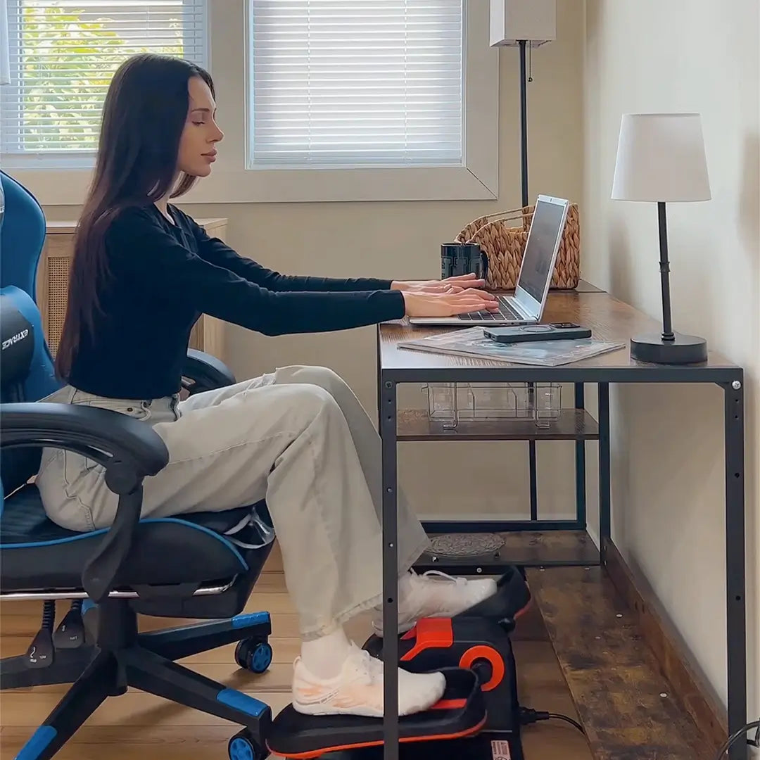 a young woman is using Tousains mini elliptical machine while working at home